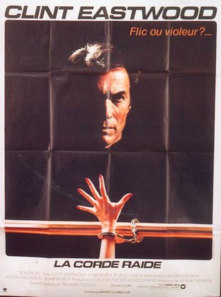 a poster of a man with handcuffs on his hand