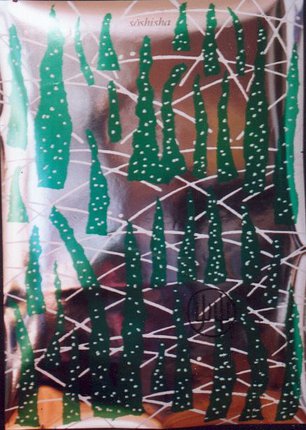 a green and white design on a glass surface