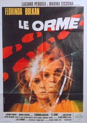 a poster with a woman's face and broken glass