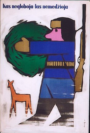 a man holding a rifle and a deer