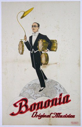 a man in a tuxedo holding drums