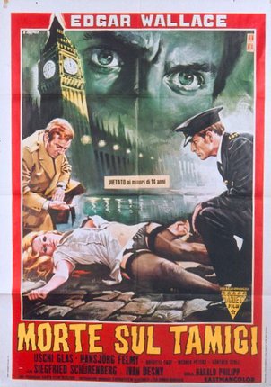 a movie poster with a man and a woman lying on the ground