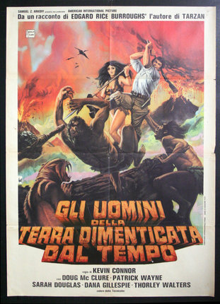 a movie poster of a man and woman fighting with monsters