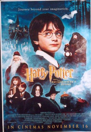 a movie poster with a boy wearing glasses