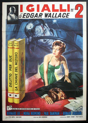 a movie poster of a man lying on the ground with a woman in a green dress