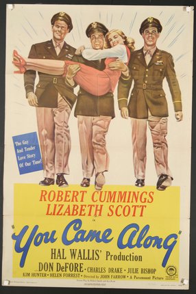 a movie poster of a man carrying a woman