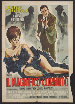 a poster of a man holding out his hand and a woman with an elaborate hairdo wrapped in fabric lying on her side