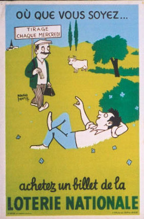 a man lying down on a field with a sign