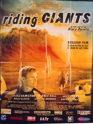 a movie poster of a man with surfboards