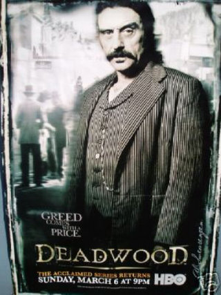 a man with a mustache on a poster