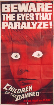a poster with a red face and eyes