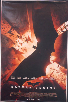 a movie poster with bats flying in the sky