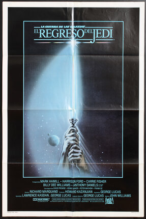 a movie poster of a hand holding a light saber