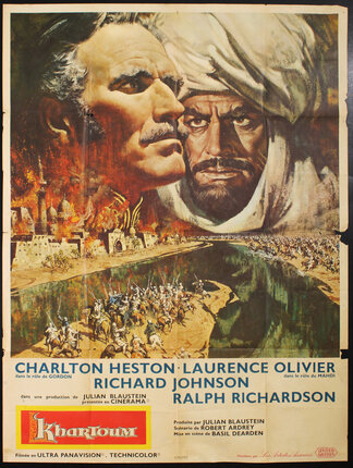  movie poster showing a large battle in front of a desert city