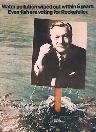 a man in a suit and tie holding his fist up in the water