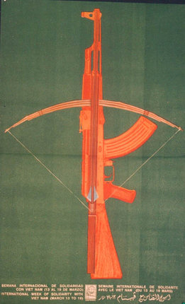 an orange rifle with a bow and arrow