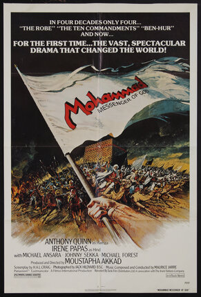 Movie poster with an illustration of a hand holding a flag in front of charging warriors on camels