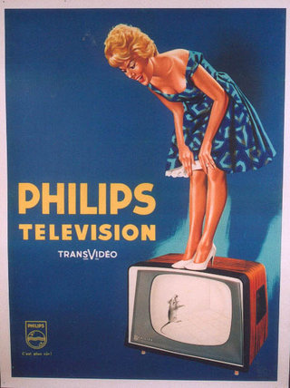 a woman standing on a television