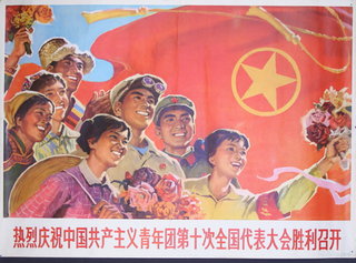 a group of people holding flowers and a flag