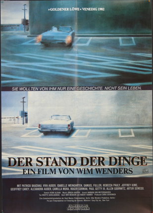 a movie poster of a car driving on a road