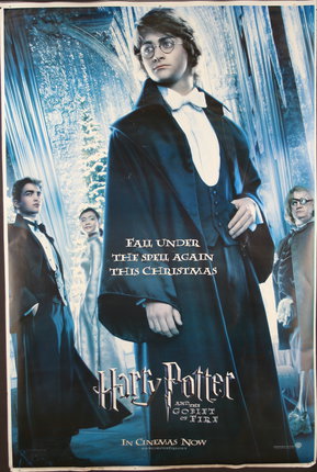 a movie poster of a man in a cape