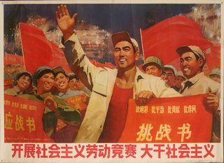a man holding a red banner