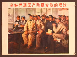 a group of people sitting in a classroom