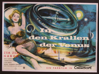 a poster of a woman sitting in a spaceship