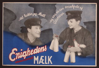 a man and woman holding milk bottles