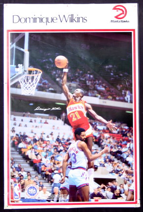 a poster of a basketball player dunking a ball