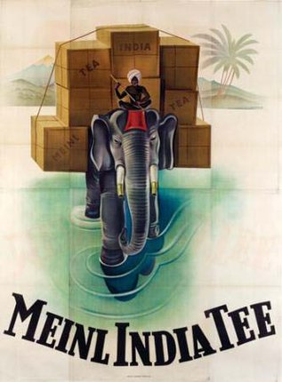 an elephant carrying boxes and a man on top of it