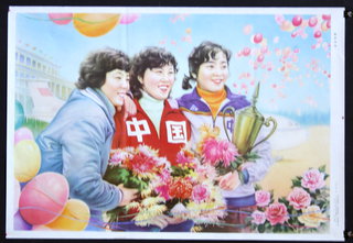 a group of women holding flowers