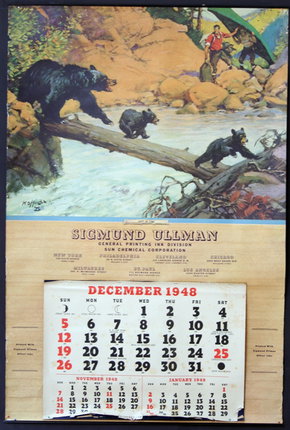 a calendar with a picture of bears on a log