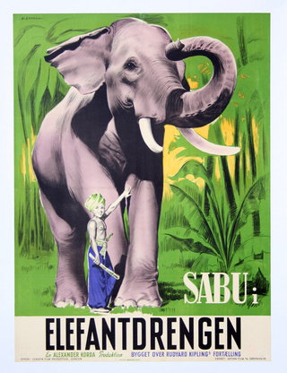 an elephant with tusks and a child standing in front of it