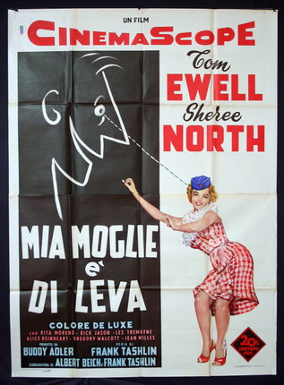a poster of a woman pulling a rope