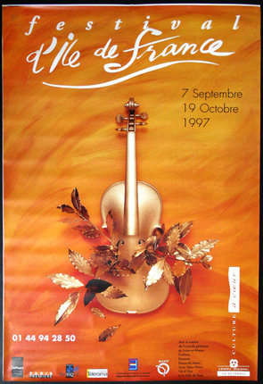 a poster of a violin with leaves