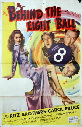 a movie poster of a woman sitting on a white surface with a number and a man's face