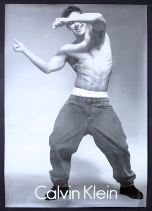 a man dancing with his arms out