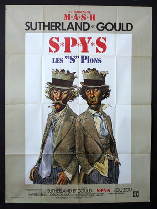 a poster of two men wearing hats