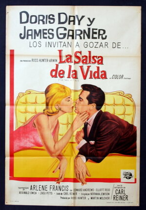 a movie poster of a man and woman kissing