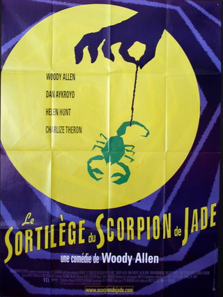 a movie poster with a scorpion on a yellow circle
