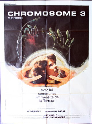 a movie poster with hands holding a planet
