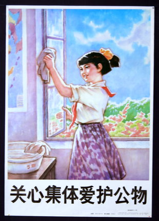 a girl cleaning a window