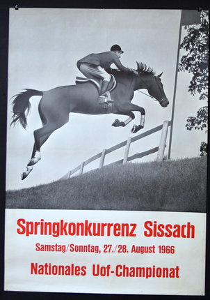 a poster with a man riding a horse