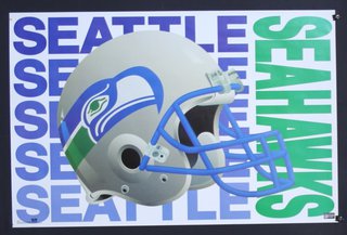 a football helmet with blue and green text