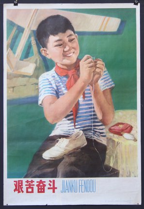 a boy sewing a shoe