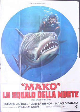 a poster of a shark and diver