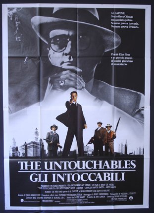 a movie poster of a man with a hat and a gun