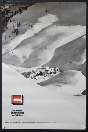 a poster with a building in the snow