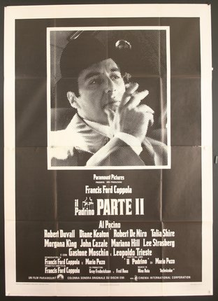 a movie poster of a man smoking